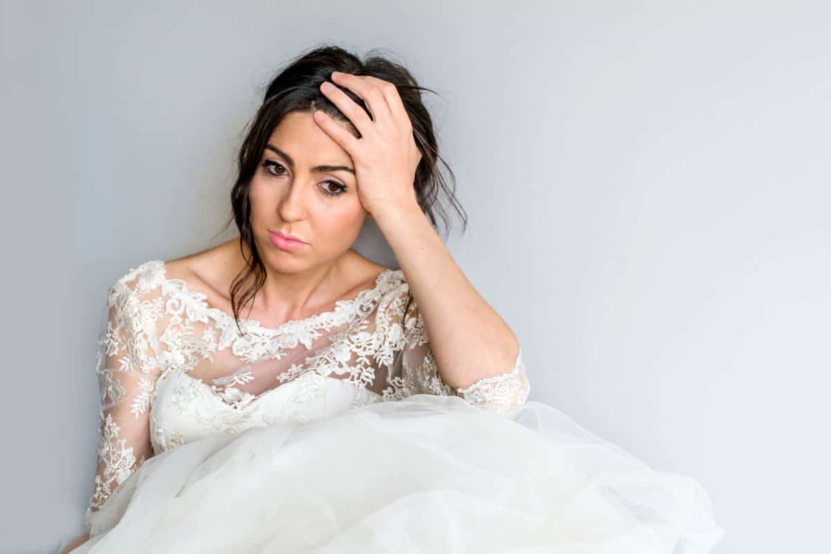 Sad,And,Worried,Bride,In,Her,Wedding,Day
